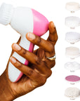 A handheld facial 7-in-1 spin brush with interchangeable heads by grace & stella.