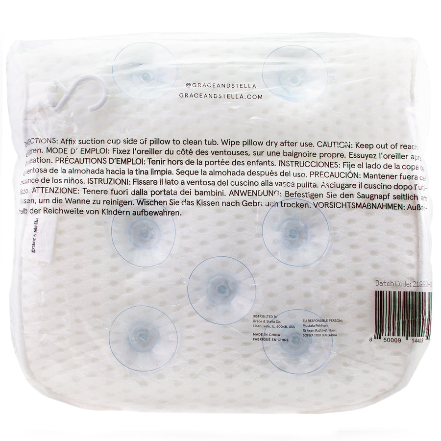 Plastic packaging with suction cups and multilingual care instructions visible through its transparent material encases a grace & stella relaxation bath pillow.