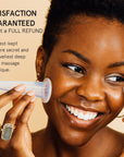 The woman is holding a Grace & Stella Co. facial cupping massage set with jojoba oil with the text "satisfaction guaranteed return," demonstrating a commitment to quality.