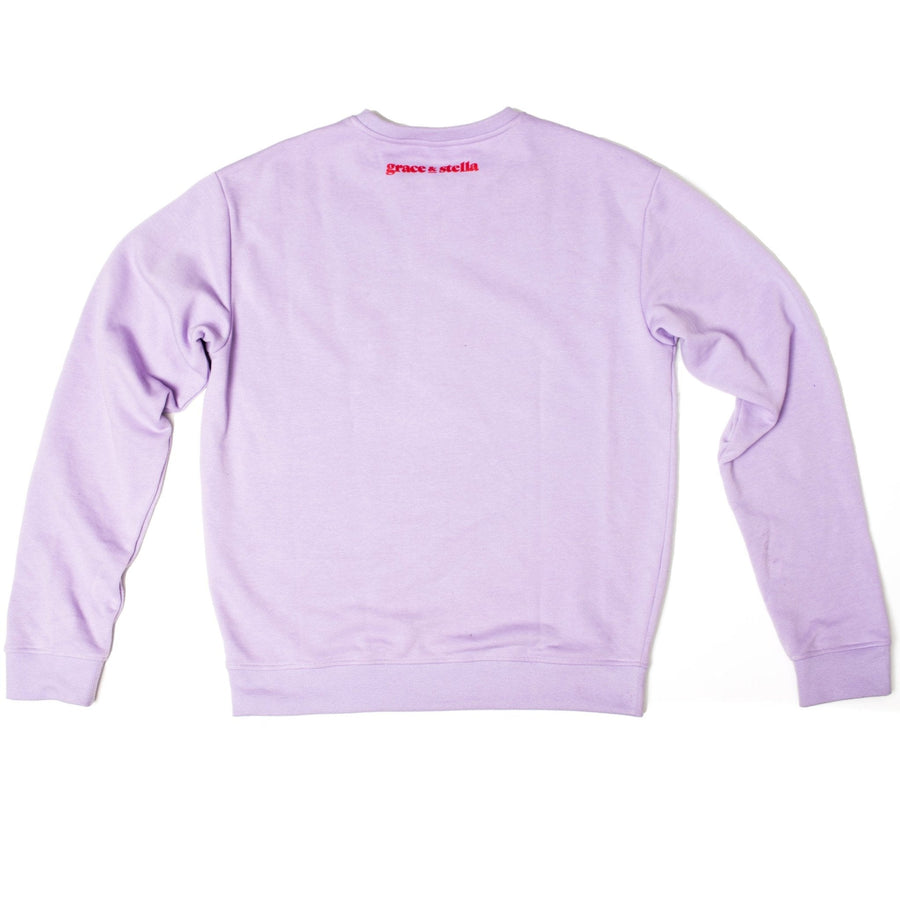 Grace & Stella feel-good club lilac crewneck sweater with a small red logo on the chest, displayed on a white background.