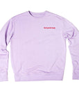 Oversized lavender sweatshirt with the Grace & Stella feel-good club lilac crewneck sweater printed on the front.
