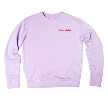 Oversized lavender sweatshirt with the Grace & Stella feel-good club lilac crewneck sweater printed on the front.