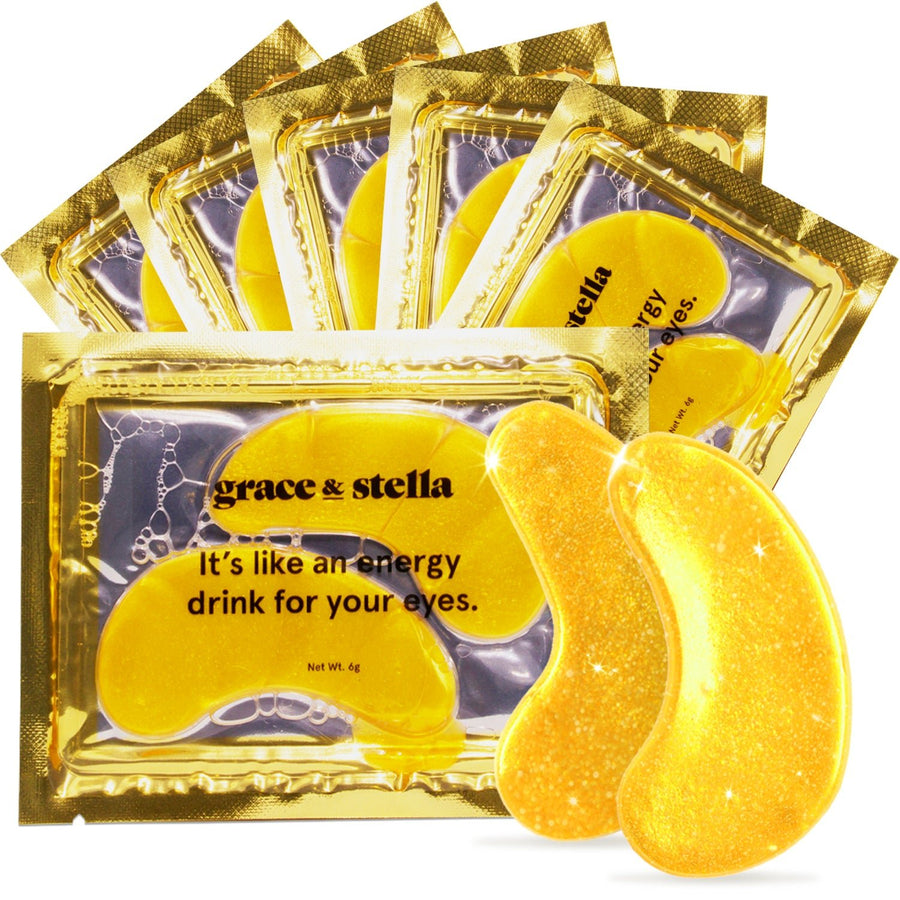 A set of packaged grace & stella golden under-eye patches arranged in a fan shape, designed for hydration and reducing dark circles.