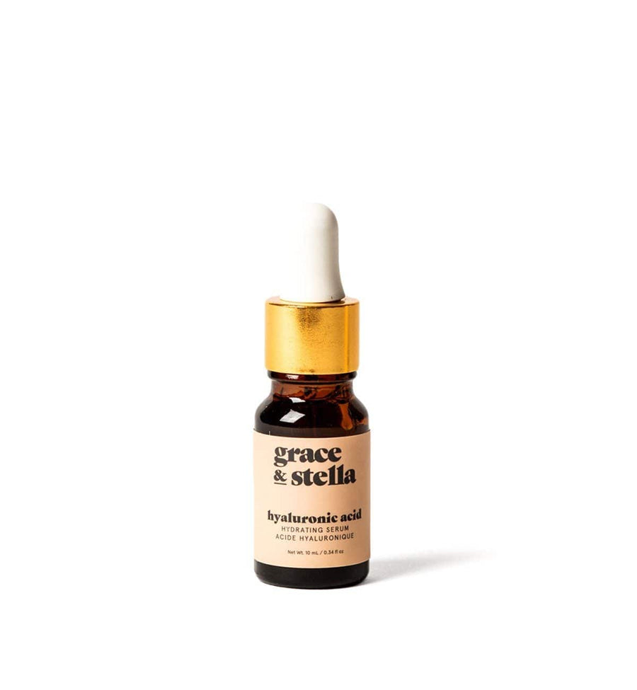A bottle of Grace & Stella Hyaluronic Acid Serum for firmness and hydration on a white background.
