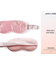 Two blooming pink sleep masks from the La Vie En Rose set with packaging featuring the text "grace & stella" and "shhh let's just sleep... sleep mask.