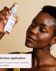 Woman applying anti-inflammatory Grace & Stella rose spray for refreshed skin.