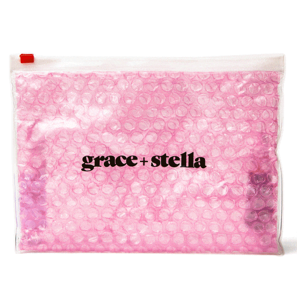 A grace & stella pouch with the text "grace stella".