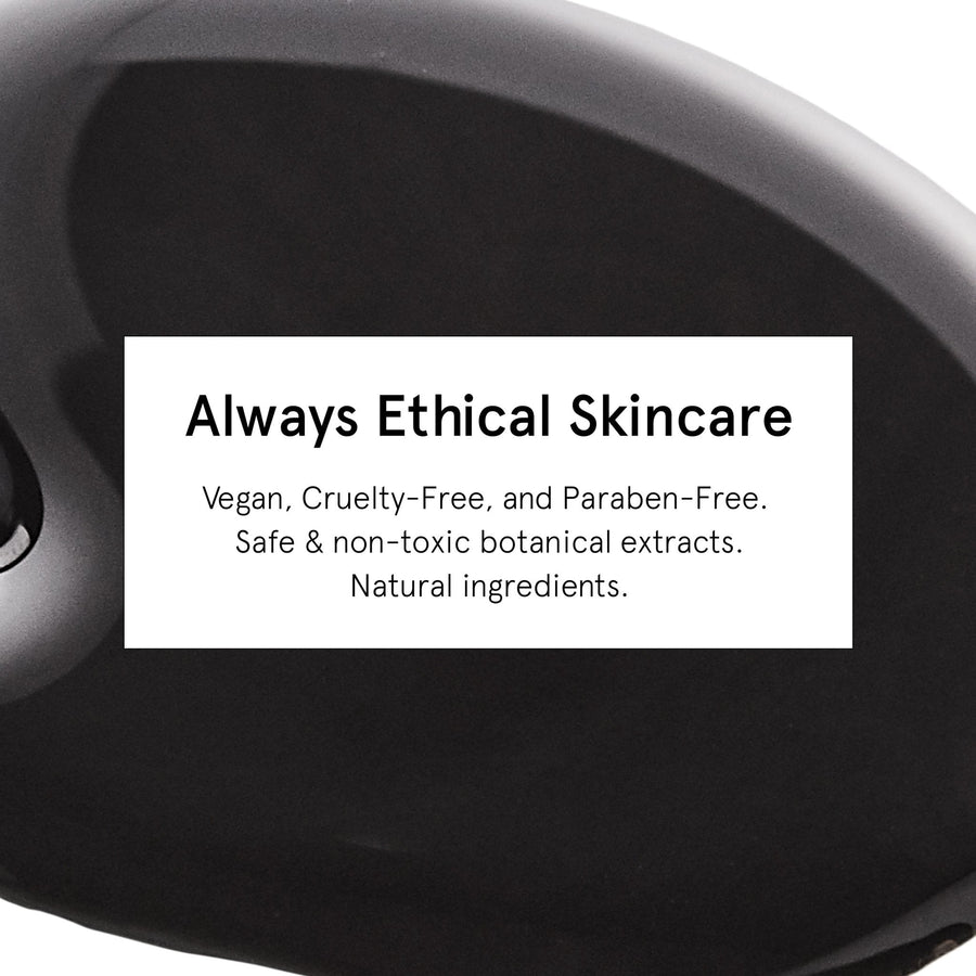 A black cosmetic container with a label highlighting ethical skincare properties: vegan, cruelty-free, and paraben-free, with safe non-toxic botanical extracts for a Grace & Stella blackhead removal peel off mask designed to eliminate blackheads.