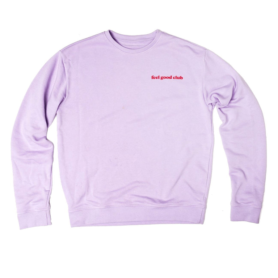 A grace & stella lilac crewneck sweater with a red logo on it, perfect for feeling good.
